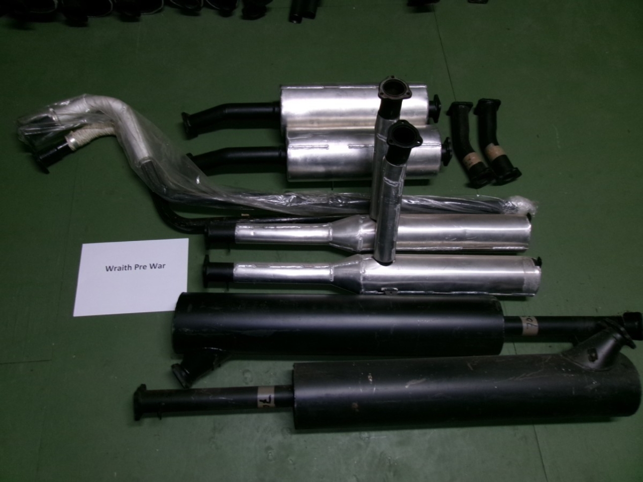 1x Front pipe & expansion box, 1x Front silencer, 1x Rear silencer, and 1x Tail pipe