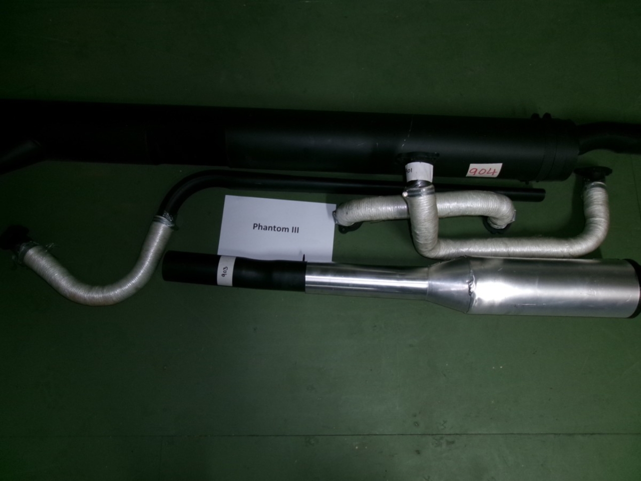1x Long down pipe, 1x Short down pipe, 1x Front expansion box, 1x Mian silencer