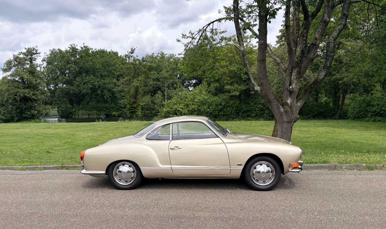Top restored Karkmann Ghia. Rare and beautiful color.